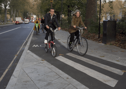 Will Norman, London's Walking and Cycling Commissioner, with Mayor of Hackney Caroline Woodley on the new protected cycle lanes