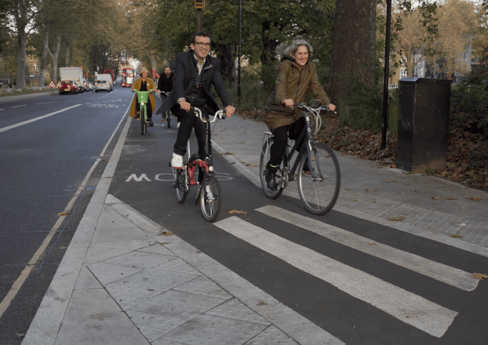 Will Norman, London's Walking and Cycling Commissioner, with Mayor of Hackney Caroline Woodley on the new protected cycle lanes