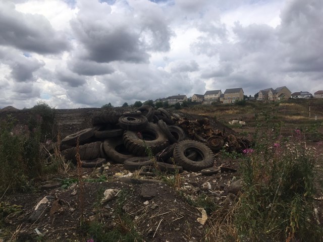 Dumped tyres before the £14m Buxton sidings regeneration