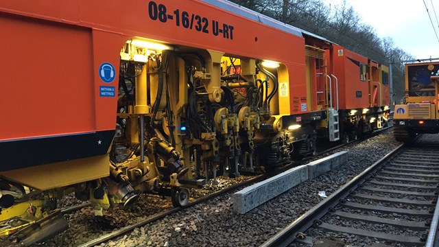 Close up of a tamping train: Close up of a tamping train