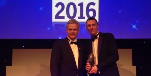 Network Rail volunteer recognised for his contribution to railway safety: Mark Carne with Tom Crosby accepting the  Judges Special Award winner at National Rail Awards 2016