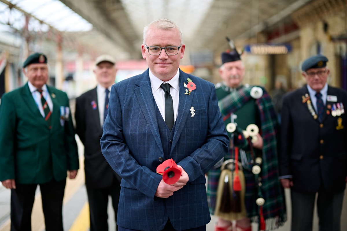 Anthony Stanley (Customer Service Assistant at Avanti West Coast, who served in the Army), joined Royal British Legion representatives at Crewe station to present a posy of poppies to the wreath