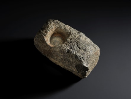 Socket-stone found near Toristay Burn, Lewis. Image © National Museums Scotland