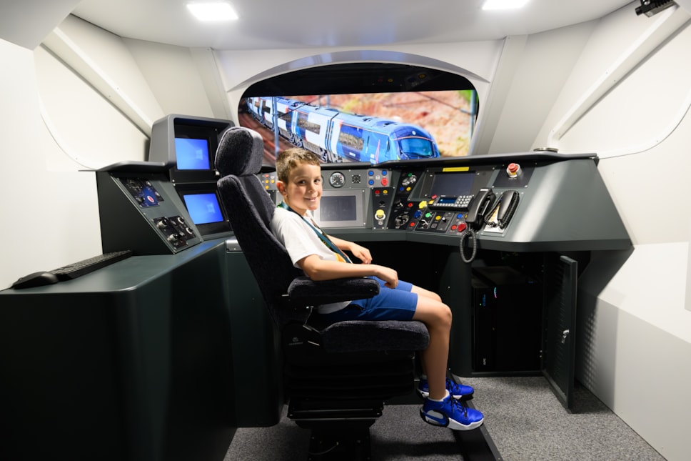 Joshua Emmett, 11, takes a seat in Pendolino simulator as part of train driver experience with Avanti West Coast