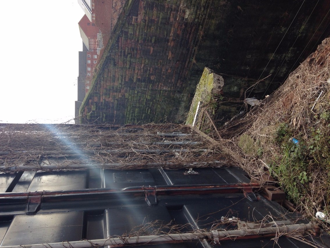 View of the damage to the wall on the approach to Liverpool Lime Street