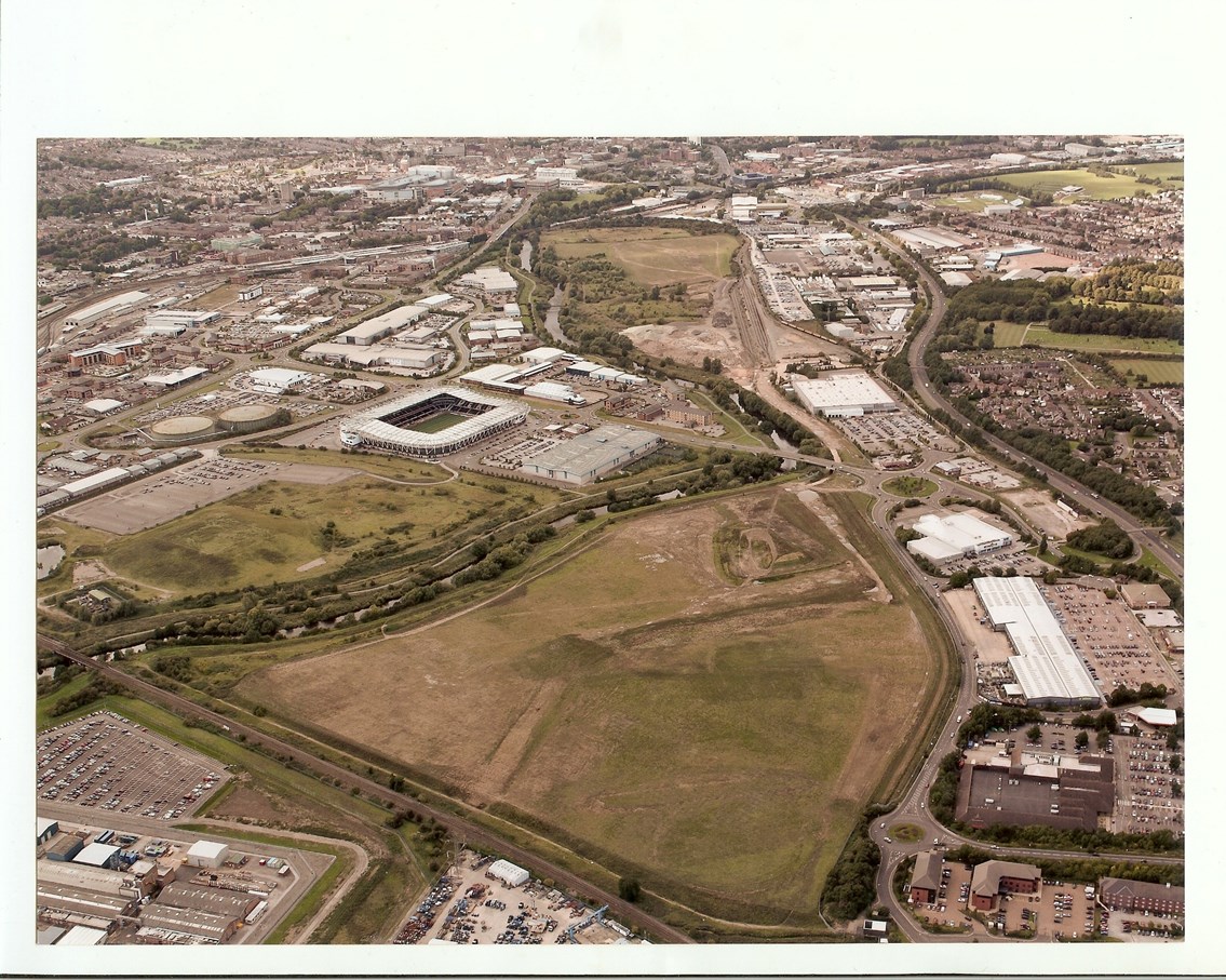DERBY BOOST AS NETWORK RAIL ANNOUNCES PARTNERSHIP WITH ST MODWEN TO DEVELOP 70 ACRE SITE AT CHADDESDEN TRIANGLE: Aeriel photo of the Chaddesden Triangle site, in Derby.