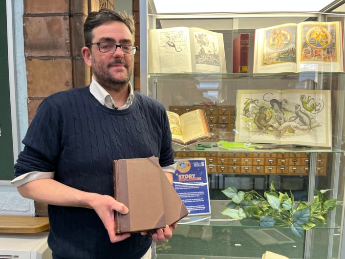 Antique book return: Special collections librarian Antony Ramm with the pair of antique library books written by a renowned 19th century geologist which have finally been returned 50 years late.
Volumes I and II of the esteemed Rev. William Buckland’s Geology and Mineralogy, written almost 200 years ago, were due back at Leeds Central Library in March 1976, but were instead discovered by staff in a charity shop in Beverley, East Yorkshire.