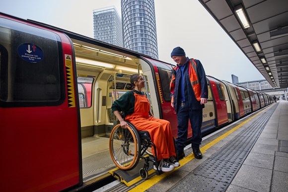 TfL Press Release - TfL publishes its step-free access consultation results as it launches a trial of a brand new bridging device on the Jubilee line: TfL Image - A customer using the bridging device.