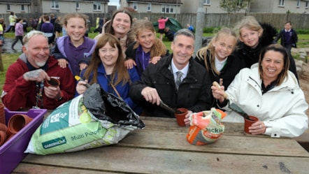 Councillors Barton and Cowan with Paddy MacDonald, Vicky McWilliam with Emma, Isobel, Sophie and Jorja from P4