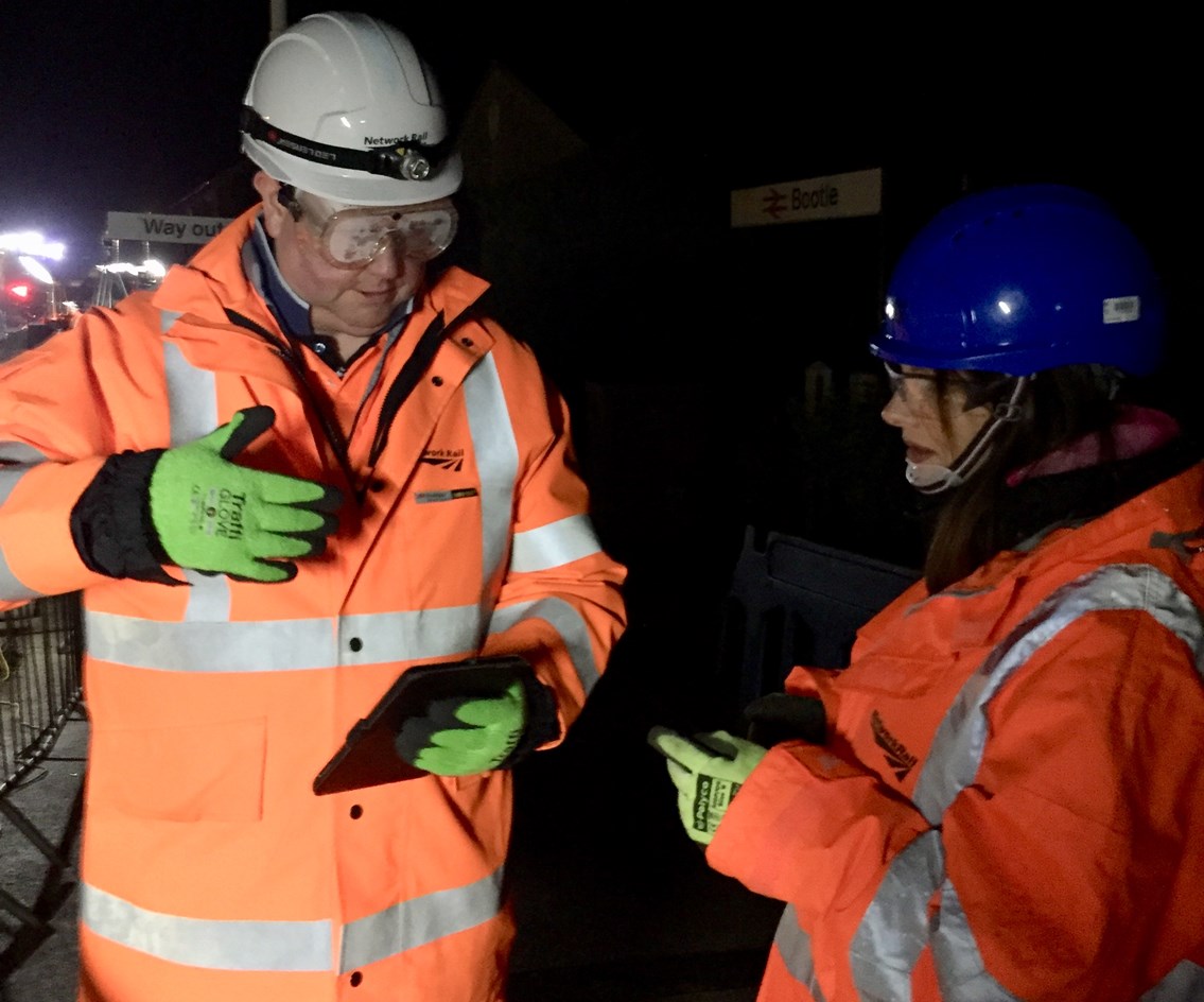 A good night’s work: MP swaps sleep for track inspection during major £3m overhaul: Planning manager Adrian Brookes with Trudy Harrison MP