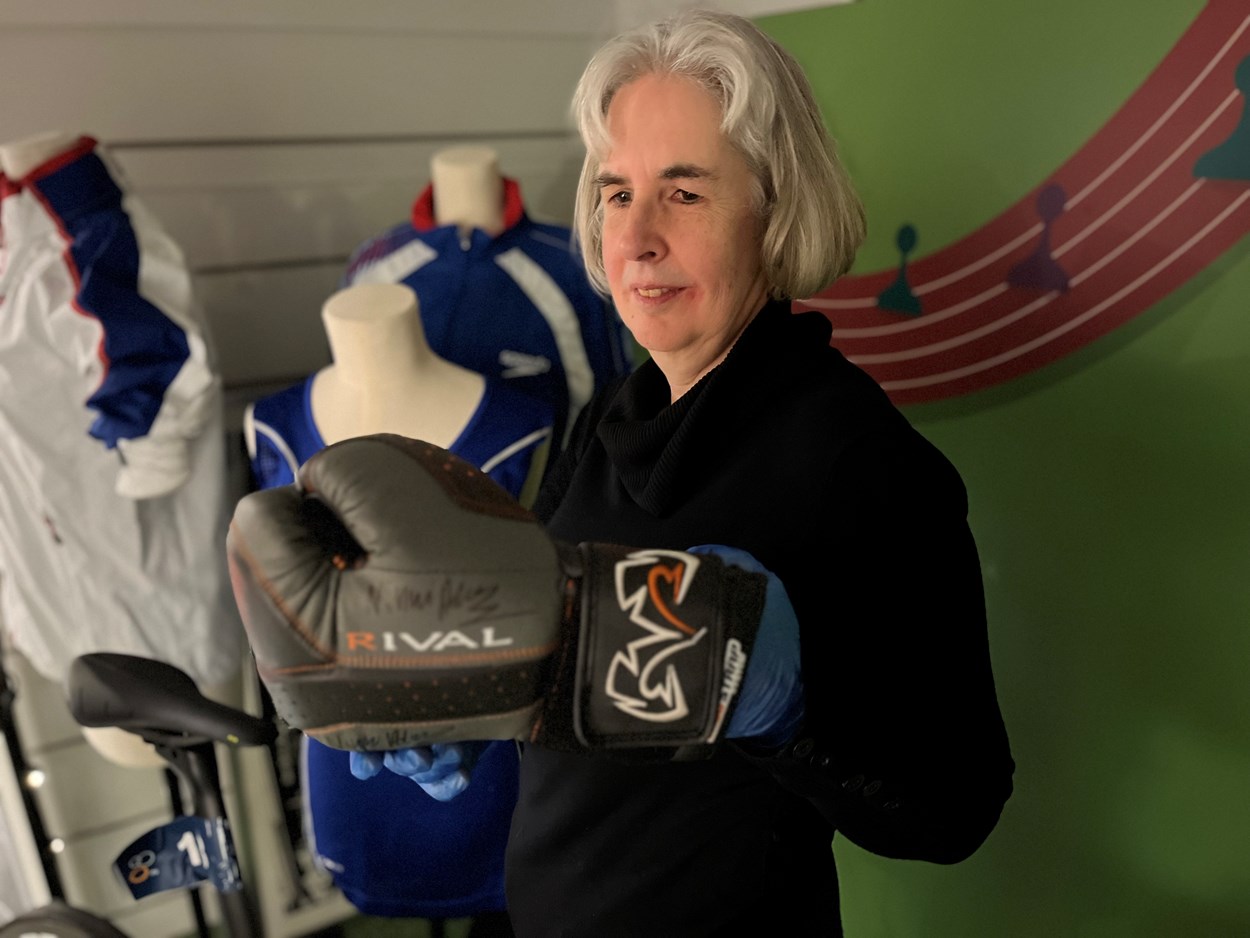 All to Play For: Kitty Ross, Leeds Museums and Galleries' curator of social history, with a glove worn by Leeds-born double Olympic boxing champion Nicola Adams.