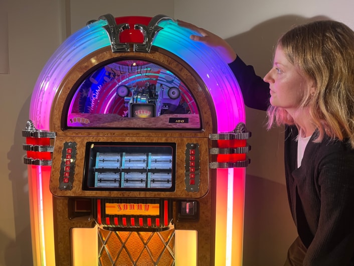 Music Leeds Us: Laura Irwin, Leeds City Museum's exhibitions curator, with a working jukebox, provided by Leeds-based Sound Leisure, the world's oldest family-run jukebox company.