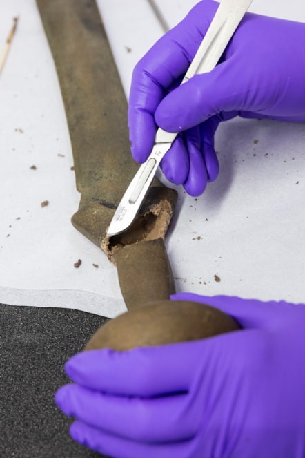 Conservator Bethan Bryan works on the Leadburn sword. Image © Duncan McGlynn (5)