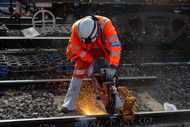 Warrington - Dallam Junction rail being cut: Warrington - Dallam Junction rail being cut
