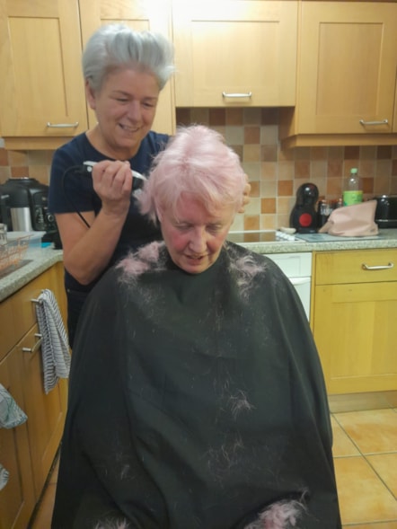 Linda getting her head shaved