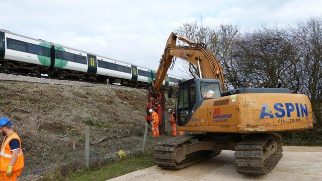 Ripe landslip: The first sheet piles go into the embankment at Ripe, Sussex