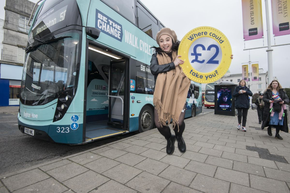Laura Tilly Green, regular bus passenger, jumping for joy