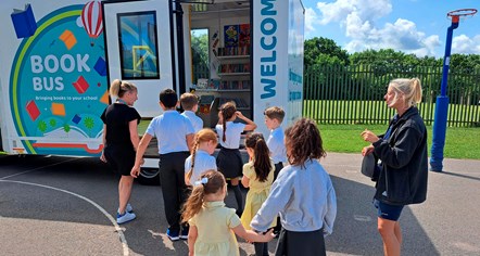 Pupils from Woodland Community Primary School in Skelmersdale enter the  school mobile bus along with deputy headteacher Vicky Beeley (right) and support manager for cultural services Dawn Child.