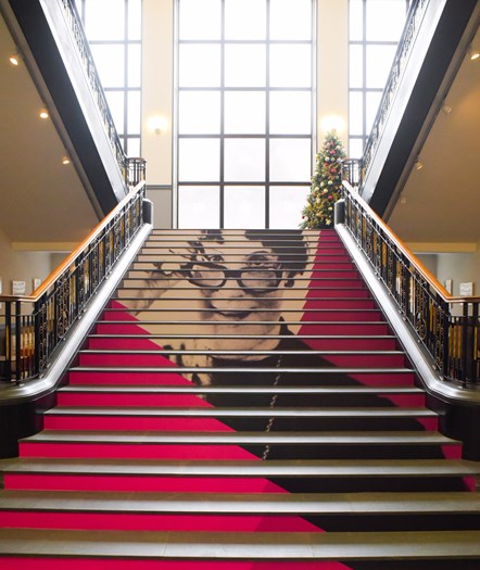 Stairs leading to the General Reading Room at George IV Bridge, Edinburgh. The stairs were dressed for ‘The International Style of Muriel Spark’ exhibition in 2018.
