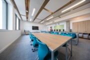 Wester Hailes HS classroom: A view of a classroom at Wester Hailes High School, featuring desks, storage and a large screen