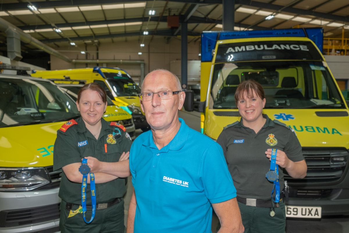 Paul Durham with paramedic Rachael Hewitt (left) and clinical care assistant Emma Newton (right)