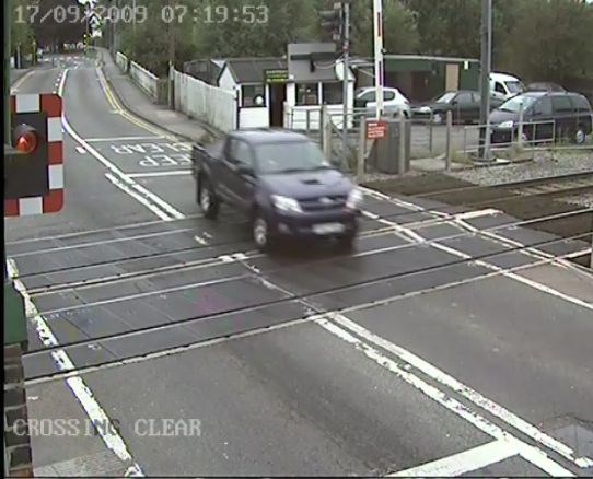 Motorist ignores warning lights at Narborough level crossing, Leicester (2): Motorist ignores warning lights at Narborough level crossing, Leicester (2)