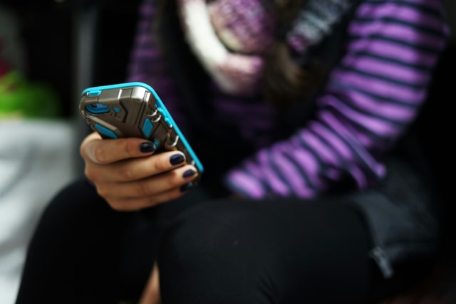 Generic mobile phone use: Free to use Unsplash photo by julie-ricard-X9ZIgLrwx-w-unsplash