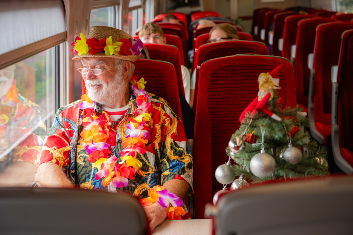 'Summer Santa' travels on LNER Azuma train with Christmas tree