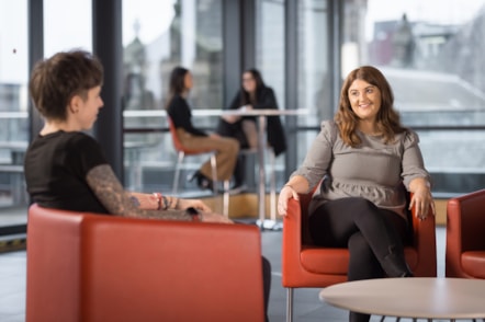 Female colleagues talking