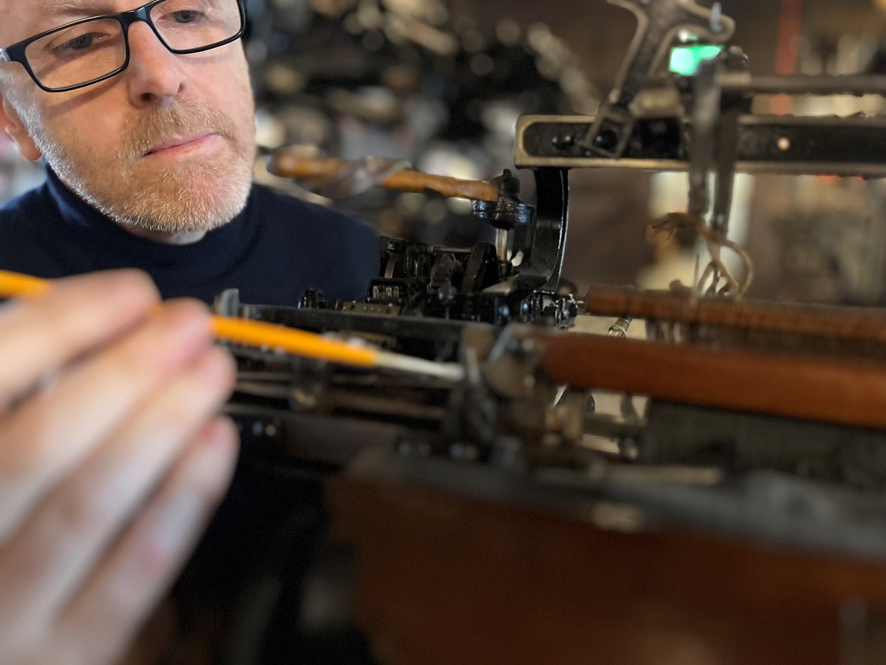 Miniature loom: John McGoldrick, Leeds Museums and Galleries' curator of industrial history, conserves the miniature scale model of the looms manufactured by Barnsley’s Wilson and Longbottom.