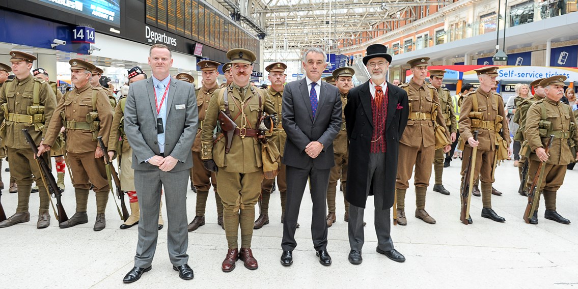 Khaki Chums launch the rail industry's WW1 exhibition in Waterloo Station: Khaki Chums launch the rail industry's WW1 exhibition in Waterloo Station
L-R Joe Hendry, Network Rail/SWT Alliance station manager; Khaki Chum Commander; Robin Gisby, MD of operations for Network Rail; Andy Savage, Railway Heritage Trust