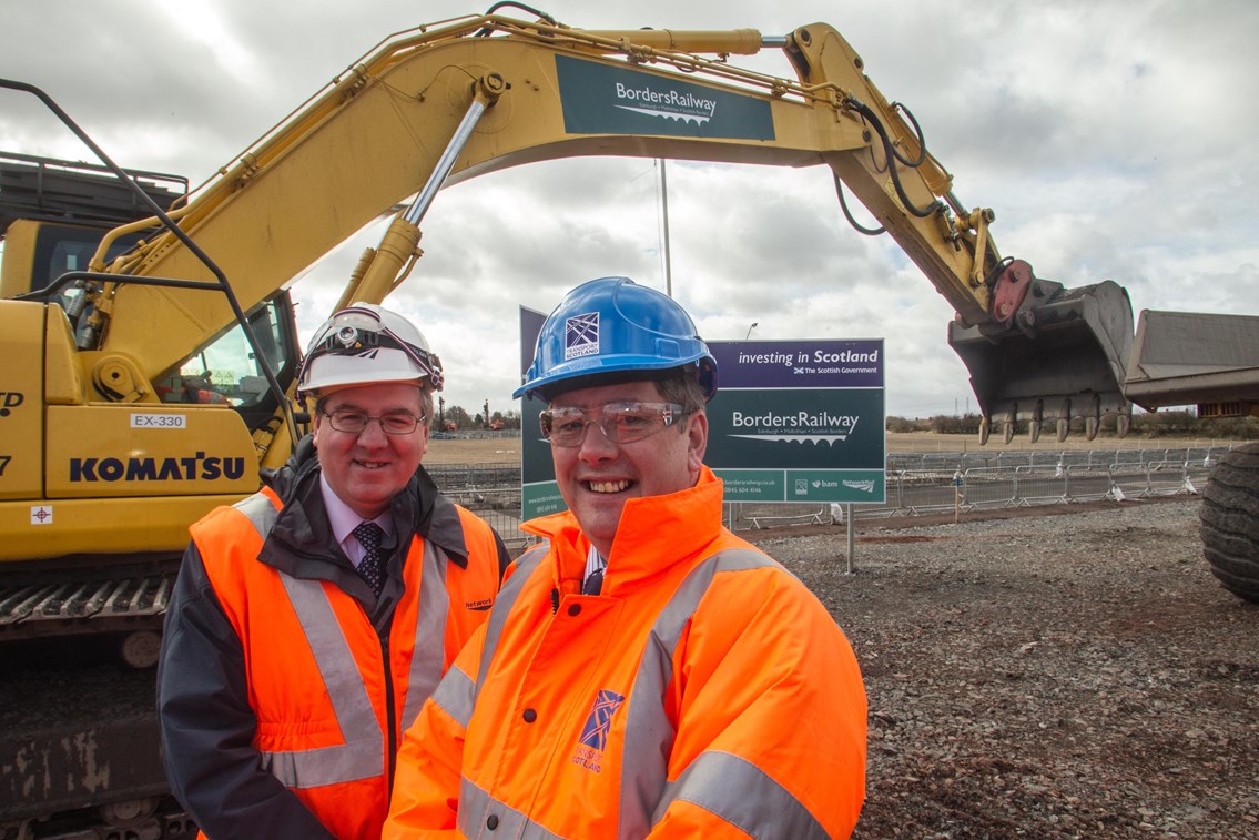 Borders: Transport Minister Keith Brown formally marking the start of the main works on the Borders Railway at the site of new Shawfair Station, near Monktonhall. Minister is pictured with David Simpson, Network Rail route managing director for Scotland (on left).