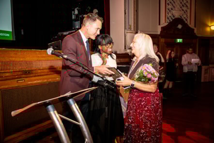Lia Smochina receives her Care Leader of the Year Award at the Dignity in Care Awards