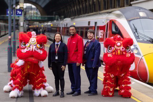 LNER Colleagues at King's Cross Station with LNER Lions ahead of Chinese New Year Parade