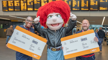LNER colleagues in Leeds station with Eleanor to share £12 fare news