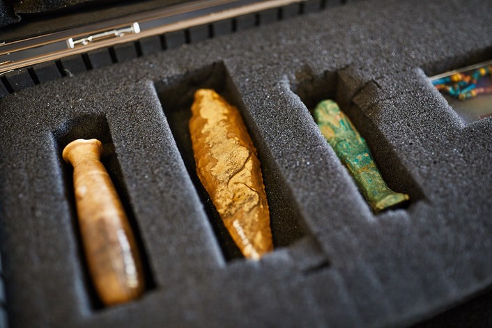 LMG Award: An Ancient Egyptian box from the Leeds Museums and Galleries collection, containing Ancient Egyptian beads, shabti, pre-dynastic stone age spear head and alabaster cosmetic pot.