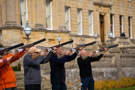 Laser clay shooting on Heythrop Park manor lawn