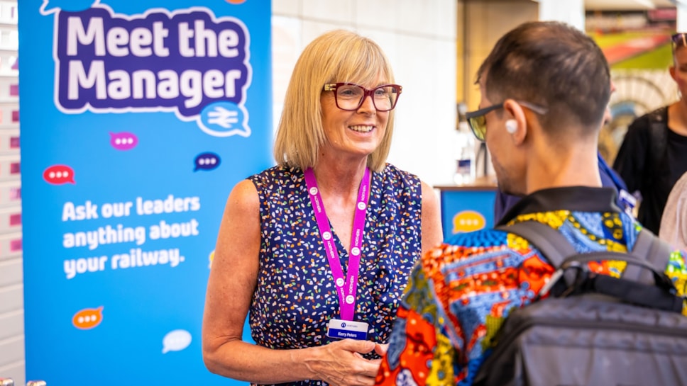 A customer speaks to Kerry Peters, Director of Stations at Northern