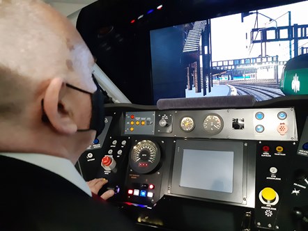 Cllr Tudor Evans on the simulator