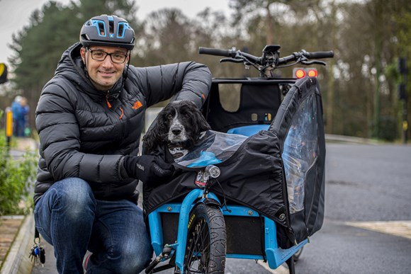 Person and dog in cycle trailer