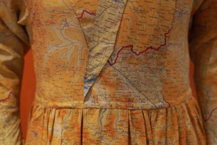 Detail of a  silk dress made from escape and evade maps used during the Second World War, on loan from Worthing Museum and Art Gallery. Image © Stewart Attwood