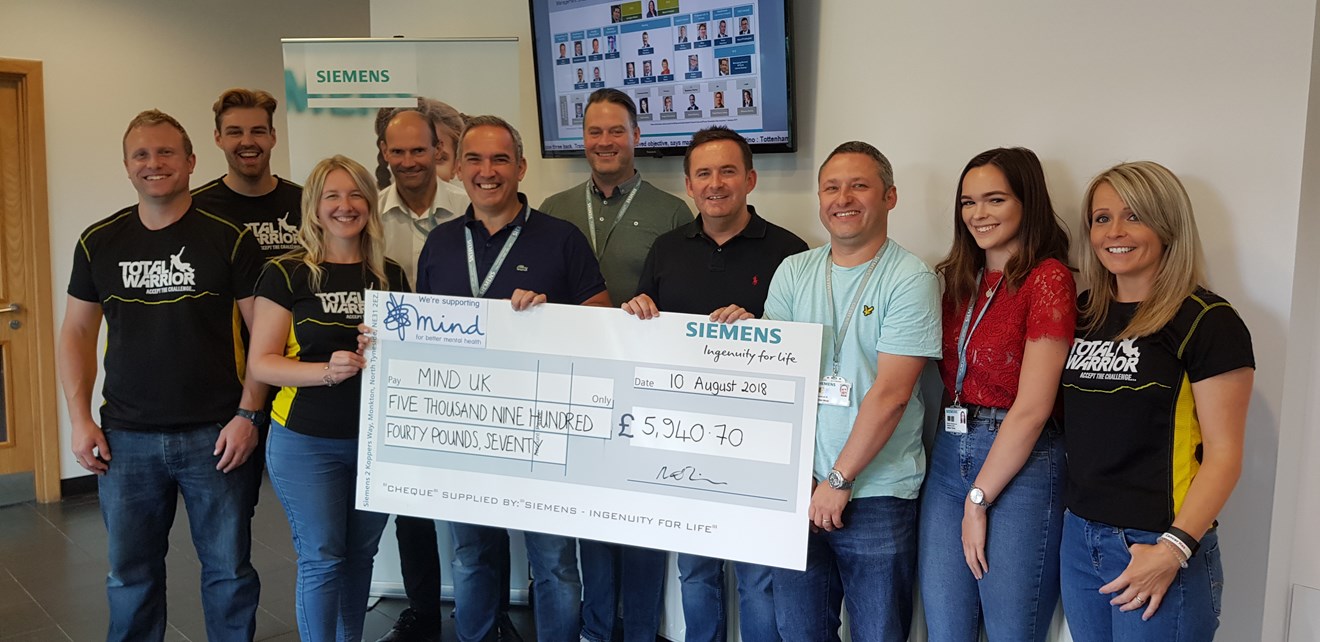 Siemens employees raise £5,940 for the mental health charity Mind: MIND UK Cheque Presentation-2