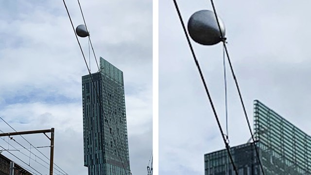 Helium balloon caught on overhead power lines on the Castlefield corridor in Manchester