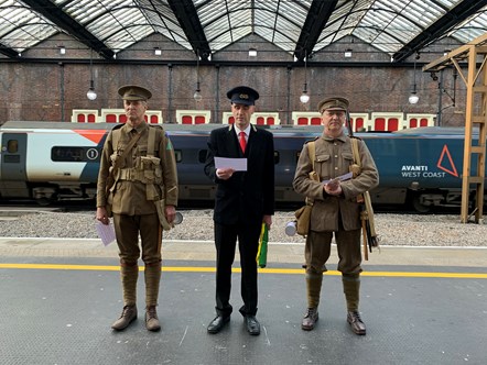 Volunteers dressed in period costumes as soldiers and a Station Master read out the names of the railway workers who are honoured on the Stoke Station War Memorial Arch