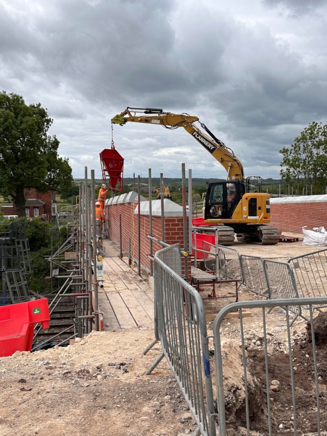 Kirk Hill -  installation of the coping stones following successful installation of the new parapets: Kirk Hill -  installation of the coping stones following successful installation of the new parapets