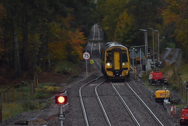 Inverness line reopens after successful delivery of eleven-day programme: Train entering new double track section at Inverness airport station