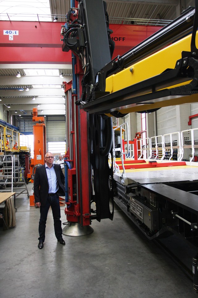 Windhoff project manager Peter Formann (who is more than 6ft) with the hydraulic piling hammer: Windhoff project manager Peter Formann with the hydraulic piling hammer, on the HOPS