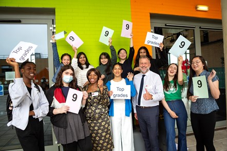 Students celebrate their GCSE results at Elizabeth Garrett Anderson School with Cllr Ngongo (front row, third from left) and Jon Abbey (front row, third from right)
