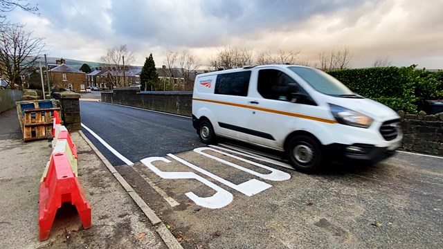 Residents and motorists thanked as Hadfield railway bridge reopens: Network Rail van passing over Park Road bridge shortly after it reopened on Thursday 10 February-2