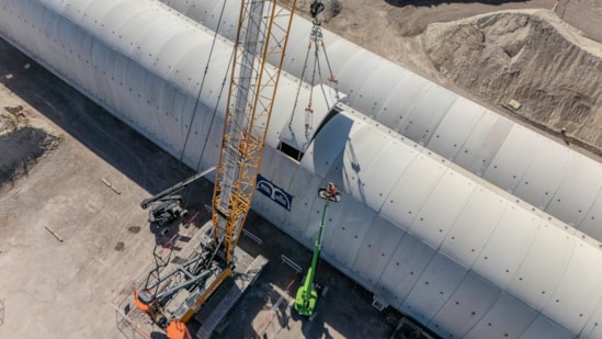 The last segment of the Wendover green tunnel being guided into position October 2026